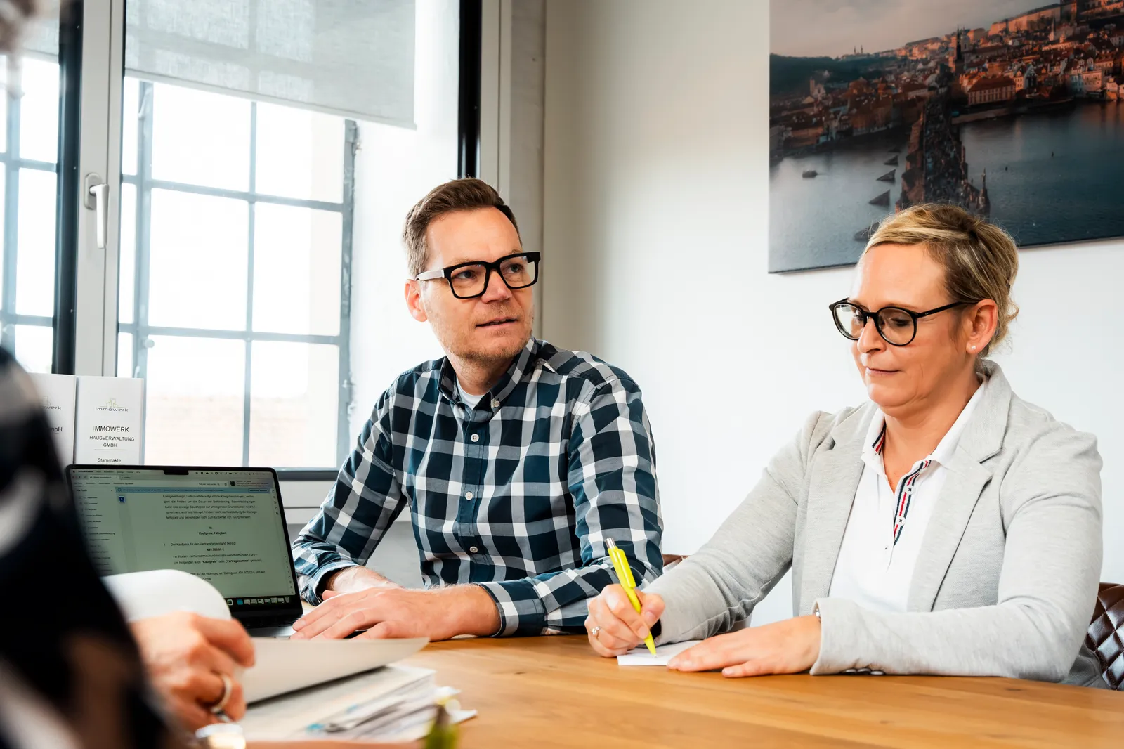 Immowerk advisors explaining the process of buying property in the Czech Republic